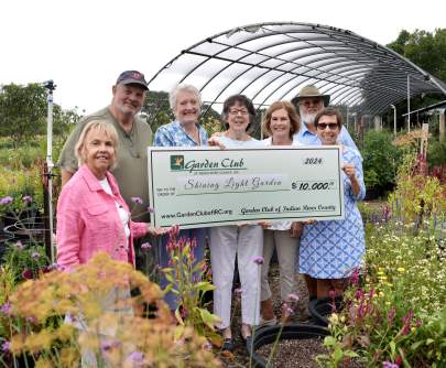 Donation to Shining LIght for $10,000 crop